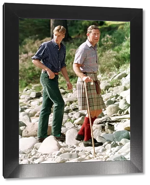 Prince Charles with sons at Balmoral August 1997 Prince William posed on the banks
