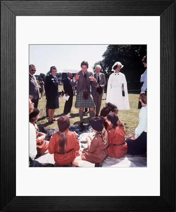 Framed Print : Prince Charles wears kilt whilst talking to Brownies in 1977