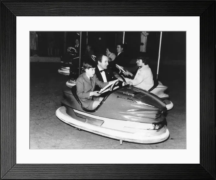 Framed Print : Charles in Dodgem car with David Monk, public relations officer for Betram Mills Framed Print : Charles in Dodgem car with David Monk, public relations officer for Betram Mills