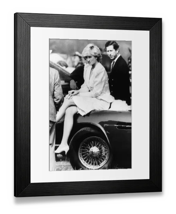 Framed Print : Princess Diana sitting on the bonnet of Prince Charles cherished J reg Aston Martin car