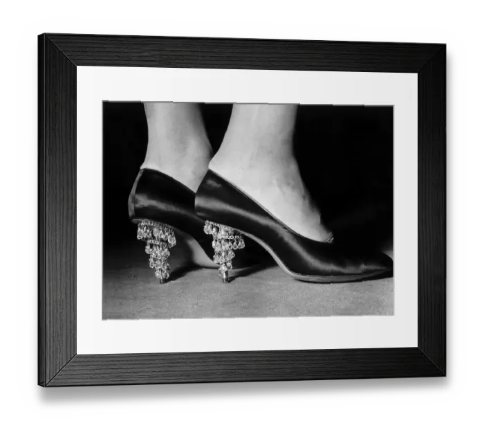 Framed Print : Sparkling chandelier drops from the heel of the evening shoes-displayed at a fashion show Framed Print : Sparkling chandelier drops from the heel of the evening shoes-displayed at a fashion show