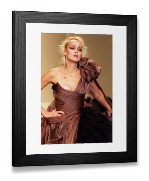 Framed Print : Jerry Hall wife of singer Mick Jagger models an outfit designed by Vivienne Westwood