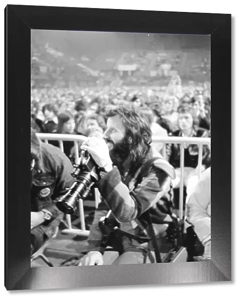 Former Beatles drummer Ringo Starr with his camera at a T-Rex concert at Empire Pool in