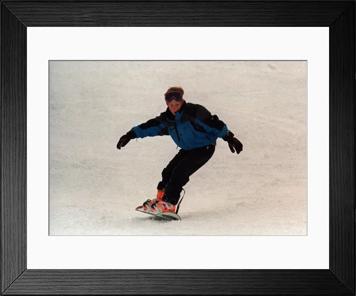 Framed Print : Prince Harry snowboarding in Klosters where he and his brother Prince William are Framed Print : Prince Harry snowboarding in Klosters where he and his brother Prince William are