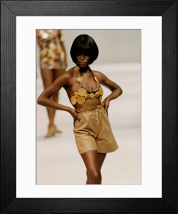 Framed Print : Model on the cat walk wearing a bra made from biscuits in the Red or Dead fashion show Framed Print : Model on the cat walk wearing a bra made from biscuits in the Red or Dead fashion show