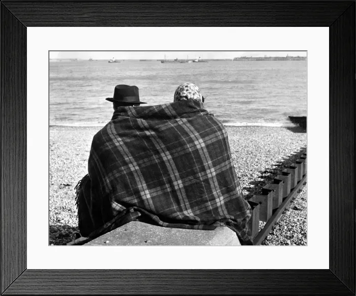 Framed Print : The sun shone on Dover but a cold north wind kept the visitors off the beach except for a Framed Print : The sun shone on Dover but a cold north wind kept the visitors off the beach except for a