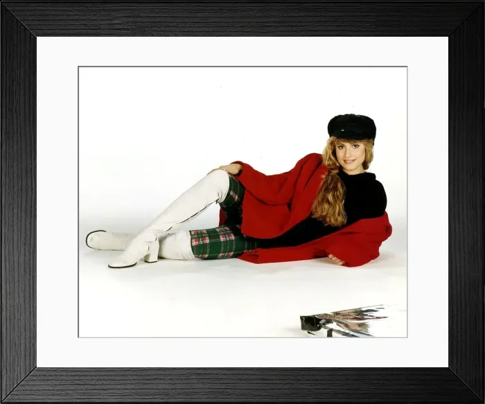 Framed Print : Clothing Fashion from Miss Selfridge model in white boots tartan leggings black top hat Framed Print : Clothing Fashion from Miss Selfridge model in white boots tartan leggings black top hat