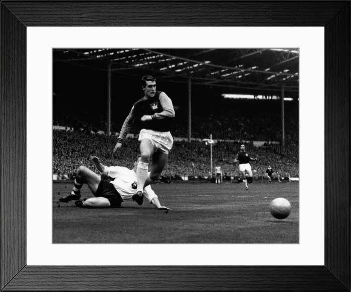 Framed Print : Goeff Hurst Football Player for West Ham United attacking the goal in the West Ham Framed Print : Goeff Hurst Football Player for West Ham United attacking the goal in the West Ham