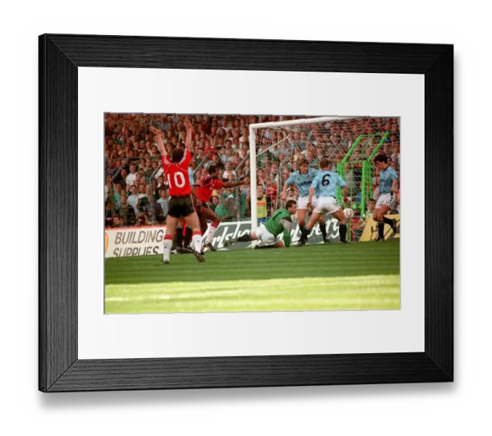 Framed Print : Manchester City 5 v Manchester United 1 mark Hughes celebrates scoring United