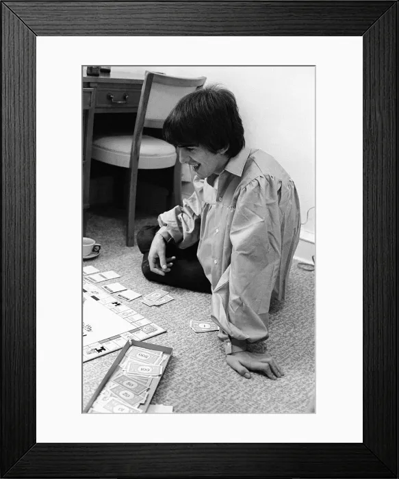 Framed Print : George plays Monopoly (with singer-songwriter Jackie de Shannon Framed Print : George plays Monopoly (with singer-songwriter Jackie de Shannon