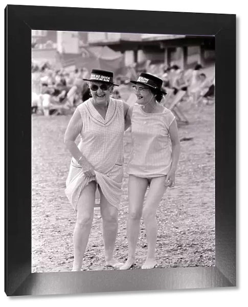 Cockney sisters May Pirie 56 and Lillian Hernandez 68 enjoy a day out at the seaside