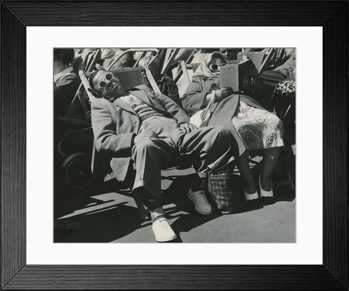 Framed Print : Holiday in Blackpool August 1953 A sleep and a read in the deck chairs