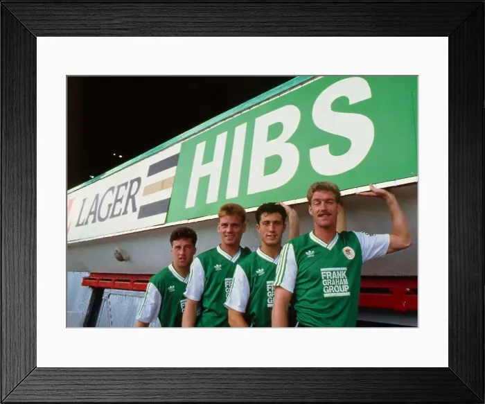 Framed Print : Hibernian football players under Hibs sign December 1988 Framed Print : Hibernian football players under Hibs sign December 1988