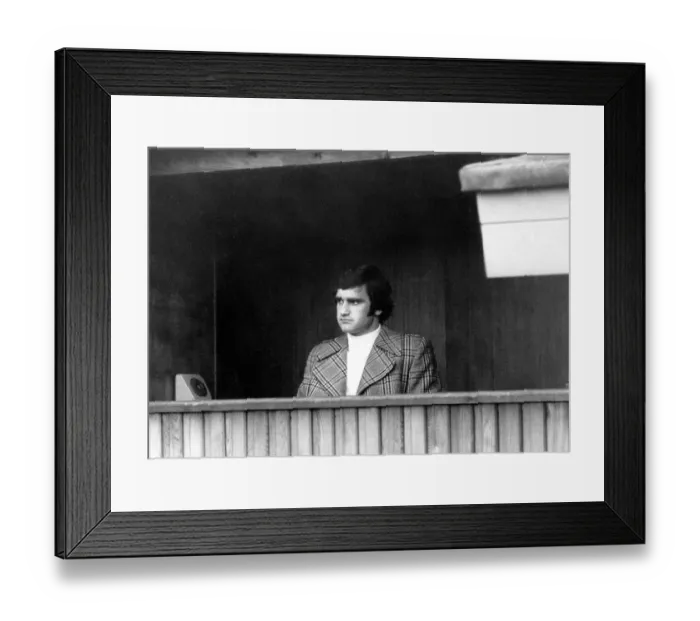 Framed Print : Watching and waiting... footballer Larry Lloyd sits it out at Highfield Road today