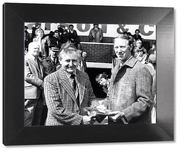 Jack Charlton is presented with a silver salver by the supporters club on his last match