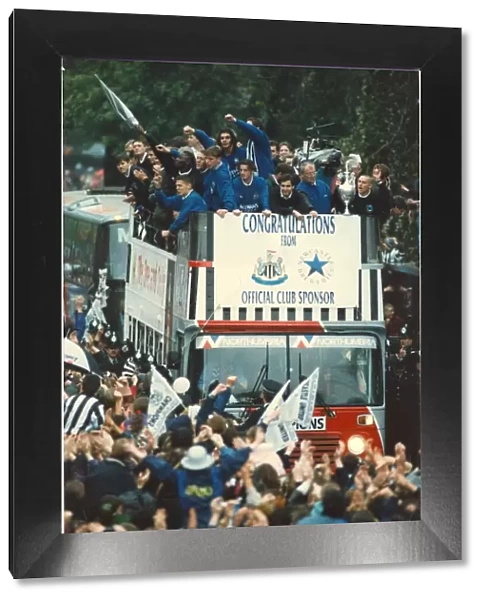 Newcastle United win the First Division - Players on the open top bus with the trophy May