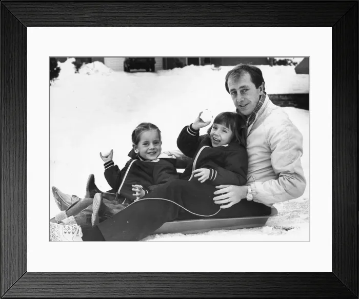 Framed Print : Newcastle United player Mick Martin enjoys a spot of sledging with his two daughters Framed Print : Newcastle United player Mick Martin enjoys a spot of sledging with his two daughters