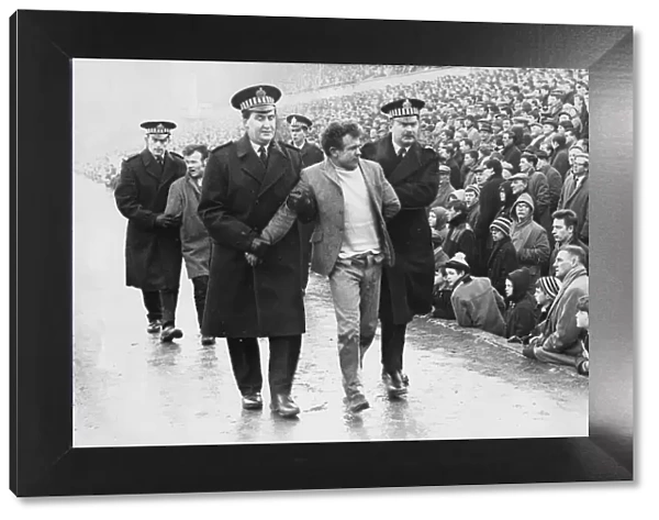 Newcastle United v Celtic 17 February 1968 - Two Celtic fans are escorted from St James