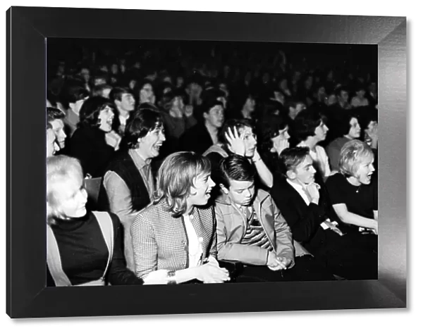 The Beatles November 1963 Fans of The Beatles cheer as the band play at the Odeon