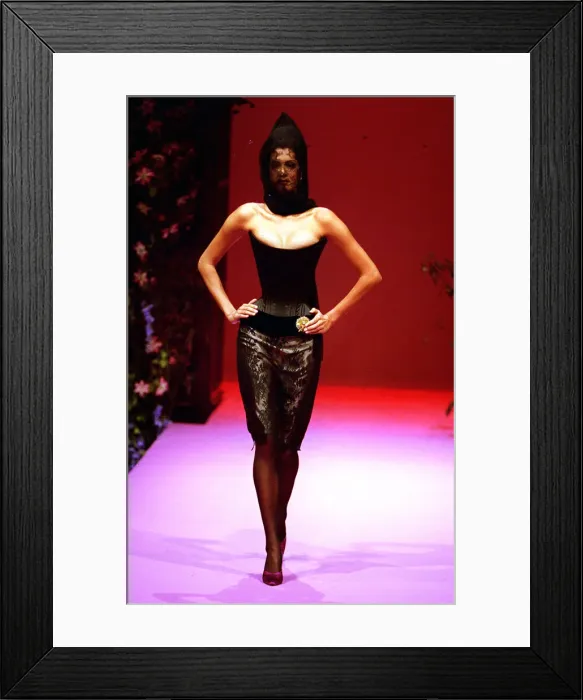 Framed Print : A Catwalk model shows a new design by designer Lacroix September 1995 Framed Print : A Catwalk model shows a new design by designer Lacroix September 1995