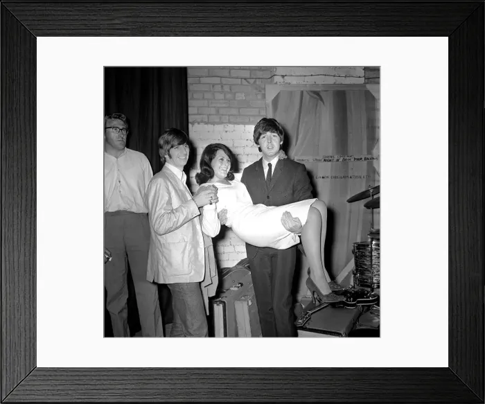 Framed Print : Paul McCartney holding Cherry Rowland as Ringo Starr watches at the Futurist theatre in Framed Print : Paul McCartney holding Cherry Rowland as Ringo Starr watches at the Futurist theatre in