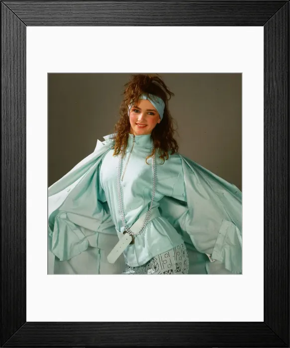 Framed Print : Teenagers fashion, April 1987 Model wearing lime green raincoat, top and leggings