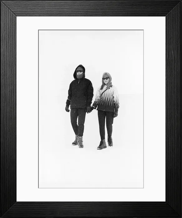 Framed Print : Beatles singer John Lennon with his wife Cynthia on a skiing holiday in St Moritz Framed Print : Beatles singer John Lennon with his wife Cynthia on a skiing holiday in St Moritz