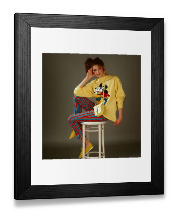 Framed Print : Teenagers dress and fashion, April 1987 Model wearing Mickey Mouse yellow
