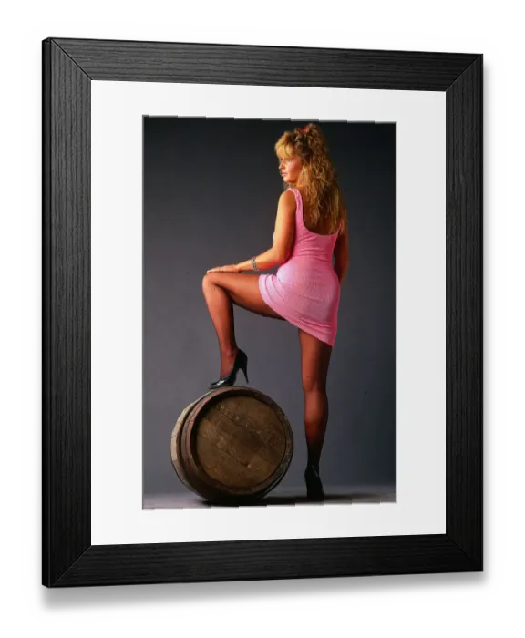 Framed Print : Mini Dress Fashion November 1987 Back view of model wearing pink lycra dress