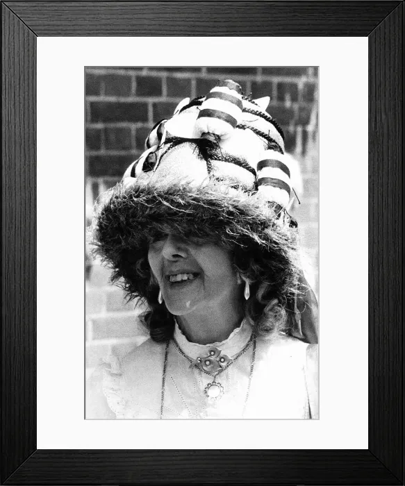 Framed Print : Fashionable racegoer in bee hat at Royal Ascot in June 1983