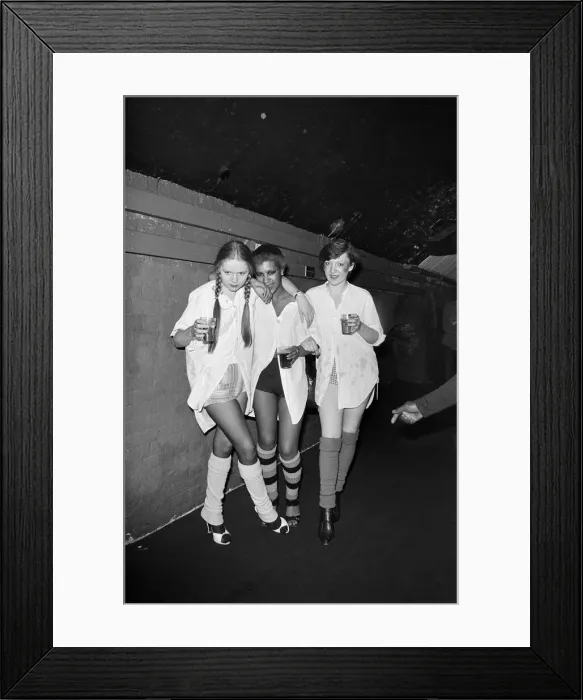 Framed Print : Punk rocker girls at disco holding beer glasses 1976