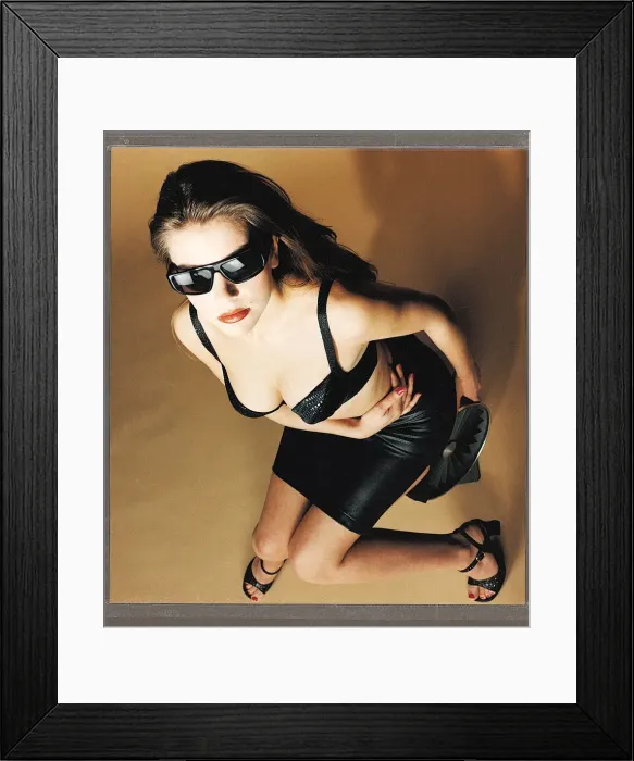 Framed Print : Womans underwear fashion female model wearing black moc crock bra by Edina Ronay
