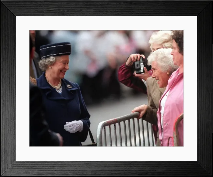 Framed Print : Queen Elizabeth II gets picture taken June 1998