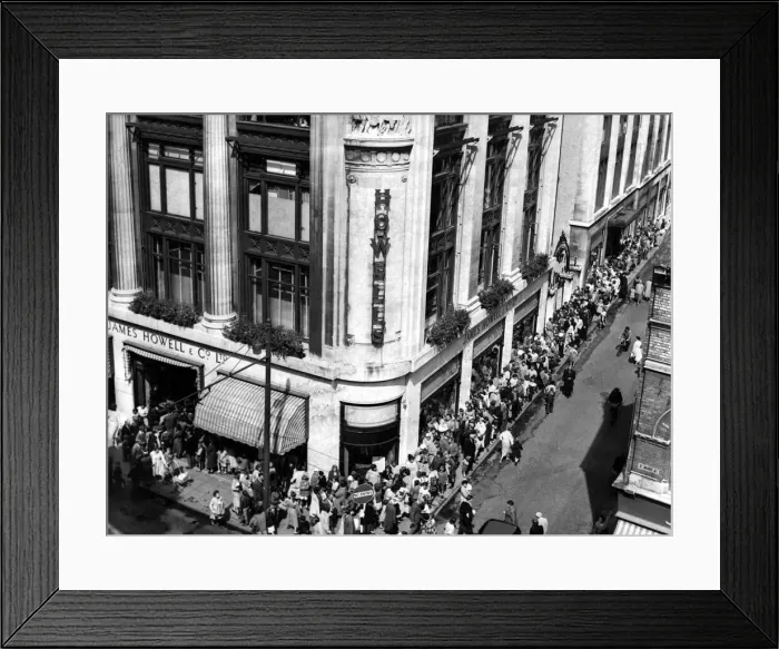 Framed Print : People queue outside Howells department store, St Mary Street, Cardiff. 7th August 1958 Framed Print : People queue outside Howells department store, St Mary Street, Cardiff. 7th August 1958
