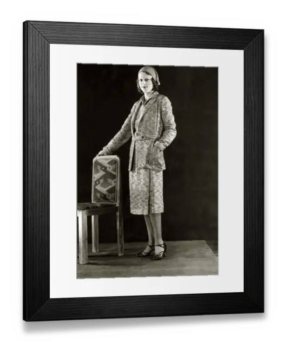 Framed Print : Black and Yellow flecked tweed sports suit - March 1931 The jumper is of yellow