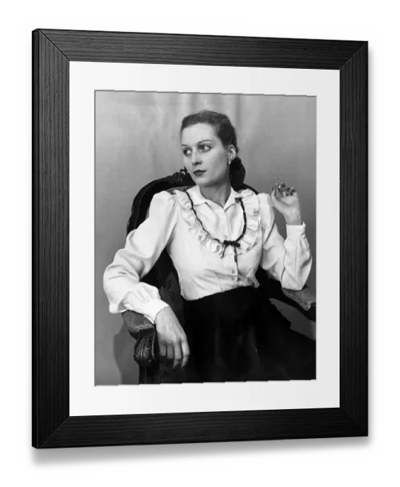 Framed Print : Two-way blouse Fashion clothing shoot January 1948 Woman reclining in chair Framed Print : Two-way blouse Fashion clothing shoot January 1948 Woman reclining in chair