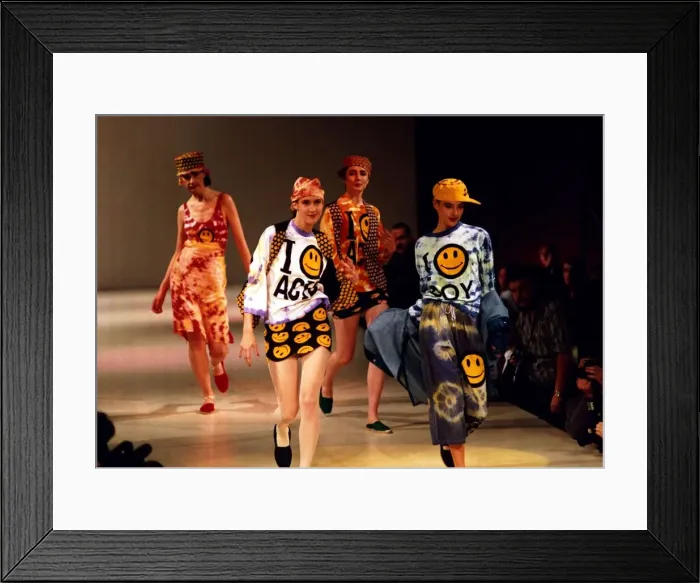 Framed Print : Smiley Fashion - Boy at Hyper Hyper catwalk models sporting designs with the yellow Framed Print : Smiley Fashion - Boy at Hyper Hyper catwalk models sporting designs with the yellow