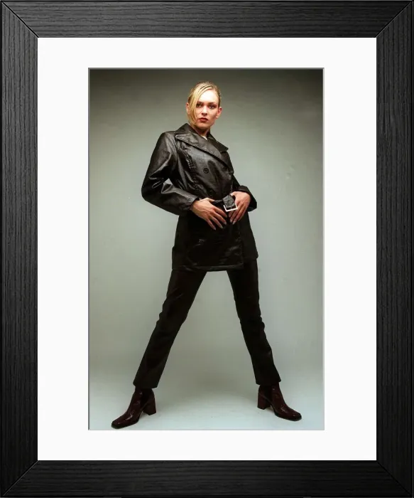 Framed Print : Fashion A model wearing black leather jacket and trousers 1996 Framed Print : Fashion A model wearing black leather jacket and trousers 1996