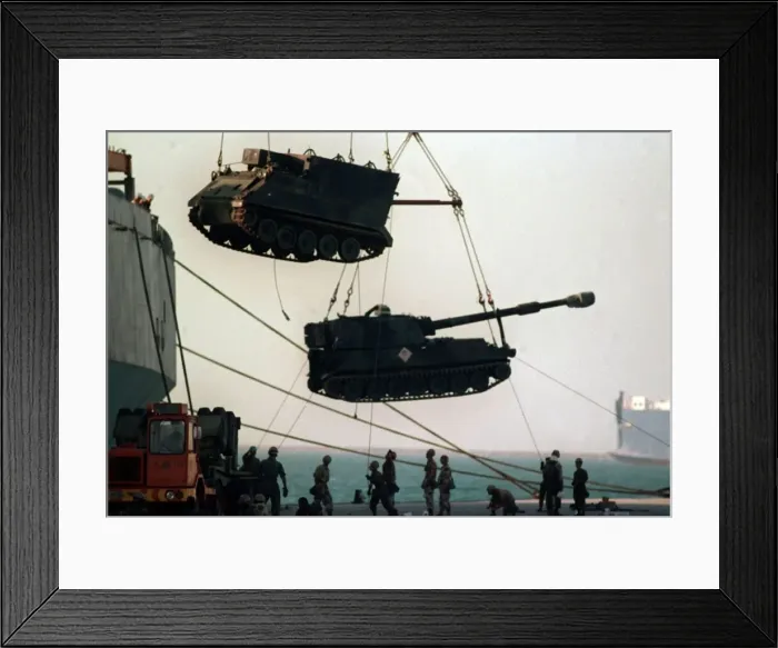 Framed Print : Gulf War Operation Desert Storm. Tanks and mobile guns are unloaded from transport ships Framed Print : Gulf War Operation Desert Storm. Tanks and mobile guns are unloaded from transport ships