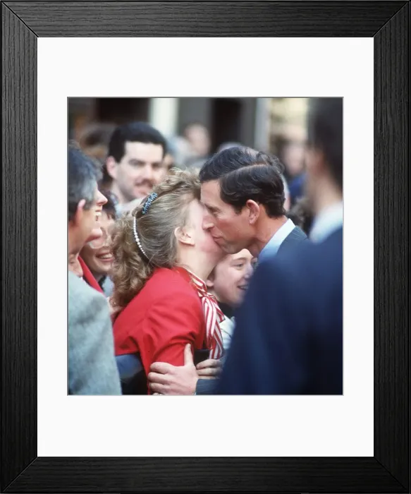 Framed Print : Prince Charles kissing girl on walkabout at the Glasgow Garden Festival 1988