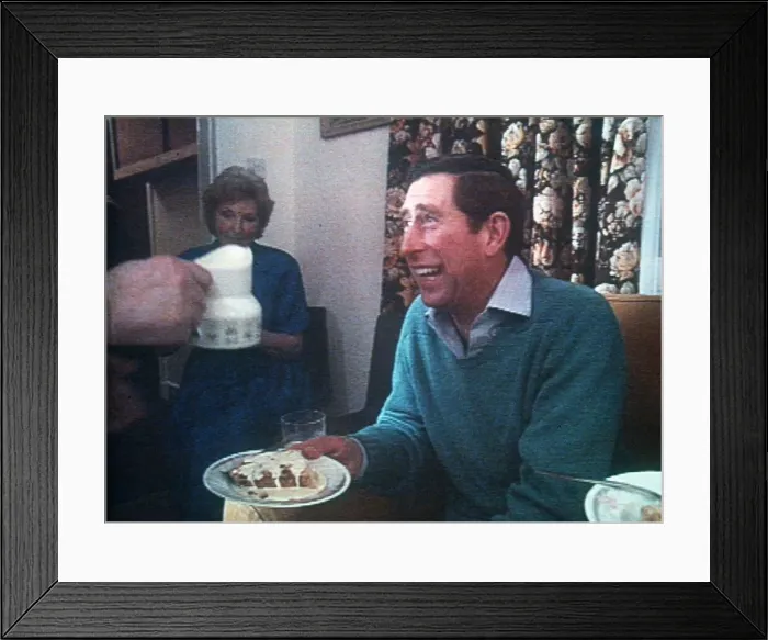 Framed Print : Prince Charles eating cake and cream in house 1992 Framed Print : Prince Charles eating cake and cream in house 1992