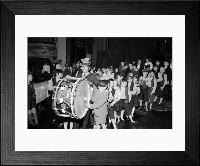 Framed Print : Lionel Bart who wrote Oliver'plays the big drum from the Irish Guards as he Framed Print : Lionel Bart who wrote Oliver'plays the big drum from the Irish Guards as he