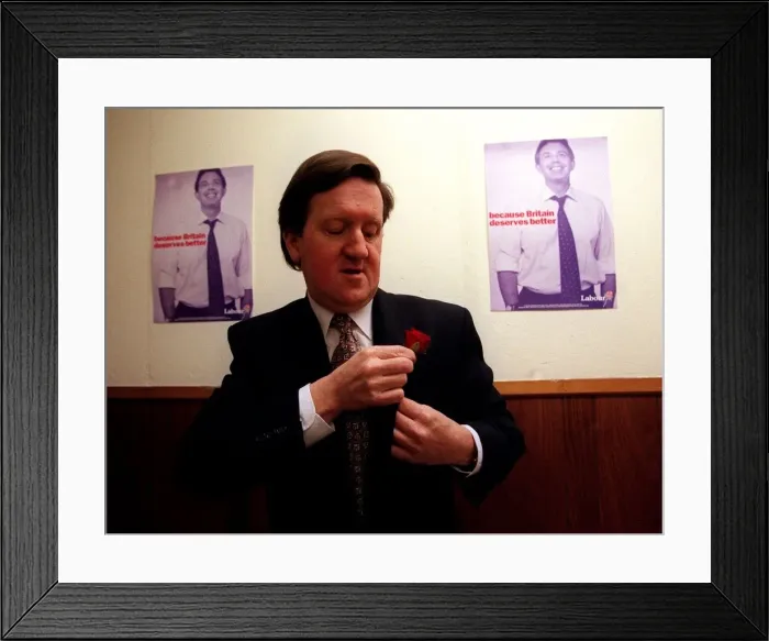 Framed Print : George Robertson at the Labour Party Press Conference looking downwards as he places red Framed Print : George Robertson at the Labour Party Press Conference looking downwards as he places red