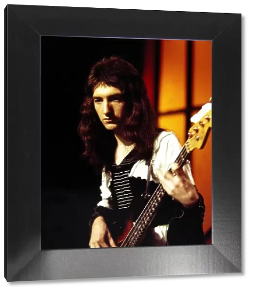 Queen - Pop Group. John Deacon seen here in rehearsals at the White City studios of Top