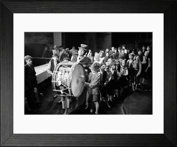 Framed Print : Lionel Bart who wrote Oliver'plays the big drum from the Irish Guards as he Framed Print : Lionel Bart who wrote Oliver'plays the big drum from the Irish Guards as he