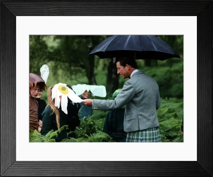 Framed Print : Prince Charles Prince of Wales umbrella kilt children dressed as flowers Framed Print : Prince Charles Prince of Wales umbrella kilt children dressed as flowers