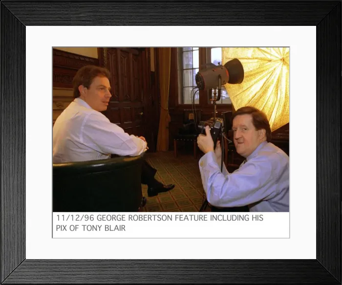Framed Print : George Robertson MP feature including his picture of Tony Blair sitting in green chair Framed Print : George Robertson MP feature including his picture of Tony Blair sitting in green chair