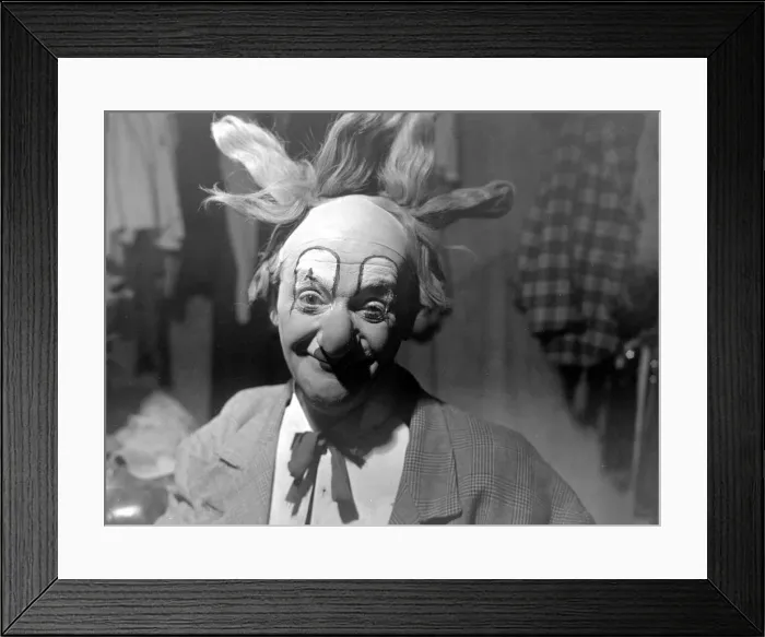 Framed Print : A Circus clown prepares for his performance in the big top 1949 circa 1949