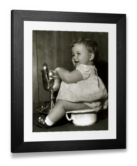 Framed Print : Little Miss Moment (9 months old) goes to the ladies toilet after winning a baby show of Framed Print : Little Miss Moment (9 months old) goes to the ladies toilet after winning a baby show of