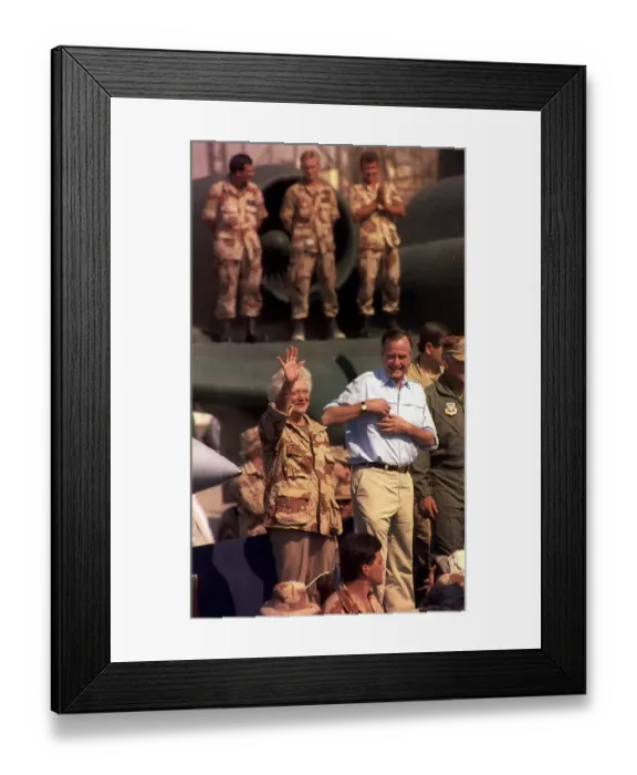 Framed Print : George Bush President of the United States with his wife Barbara waving to American army